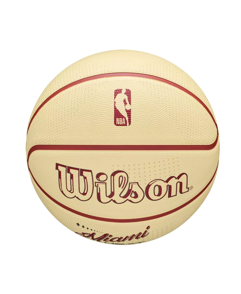 Off-white Wilson Miami HEAT Modern Rubber Basketball with red seams, featuring the NBA logo, a brand name, and the text Miami with four stars.