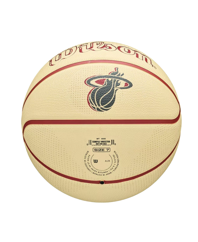 Wilson Miami HEAT Modern Rubber Basketball, an off-white size 7 ball with red seams, a Miami Heat logo, and Pressure Lock outdoor technology.