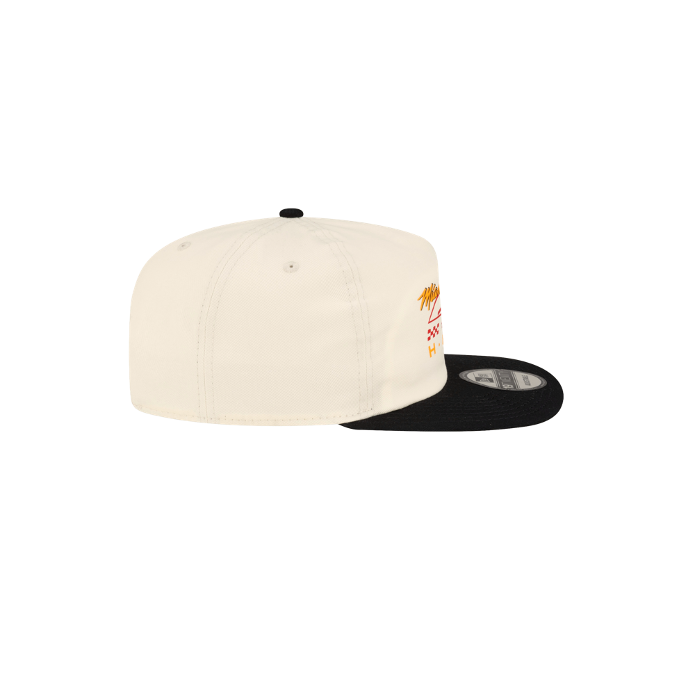 Off-white, one-size Court Culture x New Era Facade snapback hat with a black brim and a graphic featuring red and yellow text.