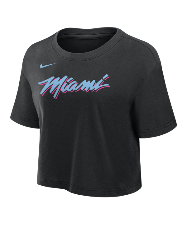 The Nike Miami HEAT Original Vice Nights Cropped Women's Tee features a black cropped fit, blue Nike logo, and “Miami” in pink and blue lettering. Made from a cotton-poly blend; wash inside out to preserve its vibrant colors.