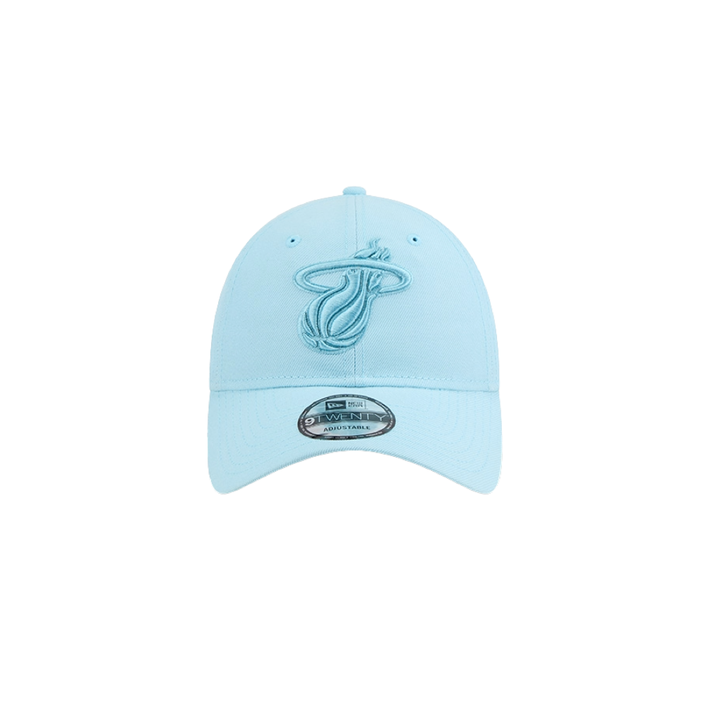 The New Era Miami HEAT Light Blue Color Pack Dad Hat is a light blue polyester cap with a raised embroidered team logo, a silver brim sticker, and an adjustable fit. Displayed on a white background, this New Era hat is easy to spot clean.