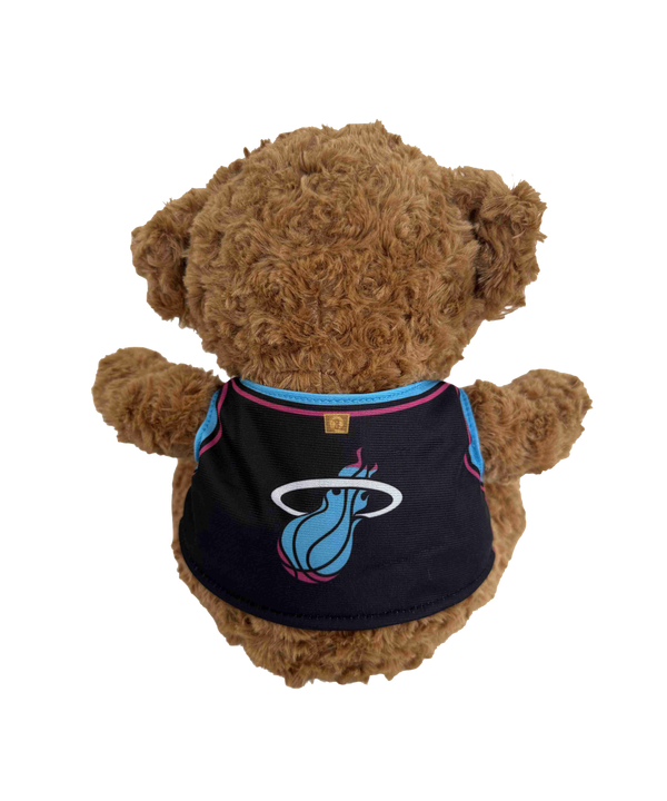 The Forever Collectibles Miami HEAT Original Vice Nights Jersey Bear is a brown teddy bear in a black jersey with blue and pink “00,” made of soft polyester fiber, sitting with arms and legs spread, suitable for ages 3 and up.