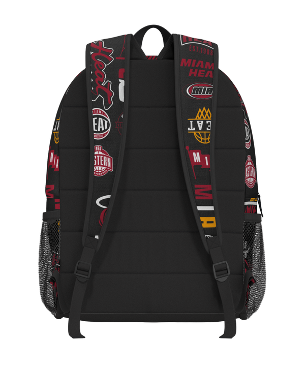 The Miami HEAT Ball Hog Backpack by Outerstuff is a black polyester backpack decorated with various Miami Heat logos and basketball-themed graphics in red, white, and yellow. It features a front zippered pocket, mesh side pockets, and adjustable shoulder straps, and is displayed against a plain white background.