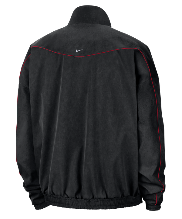 Black Nike Miami HEAT Standard Issue Woven Jacket featuring a stand collar, a small logo, and the text Miami Heat Basketball on the left chest.