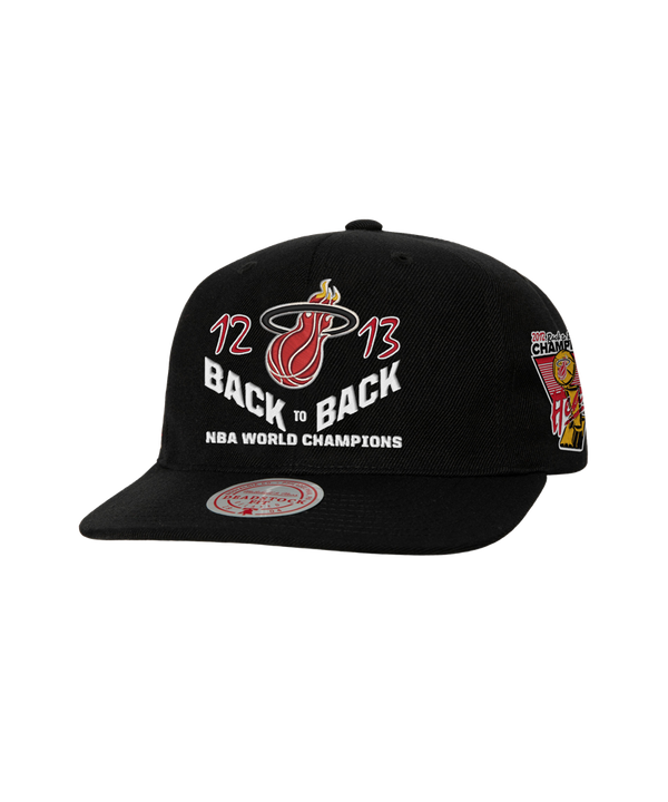 The Mitchell & Ness Miami HEAT Back-To-Back Champs Snapback features the Heat logo, 12-13 NBA Champions text on the front, a championship patch on the side, and is one size fits most with easy spot cleaning.