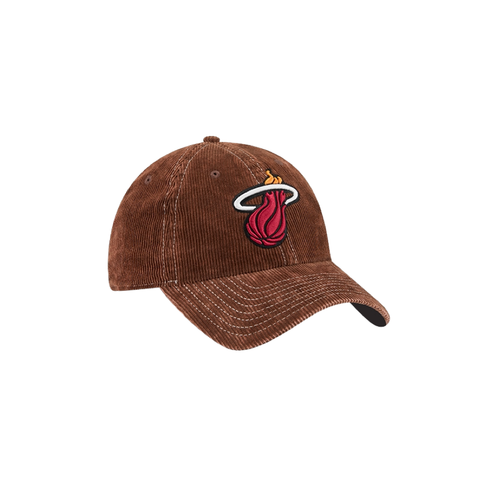 The New Era Miami HEAT Brown Corduroy Dad Hat showcases the team’s iconic logo on the front and is photographed against a plain white background. Crafted from cotton, this classic hat offers a comfortable fit in one size that suits most wearers, perfect for everyday style.