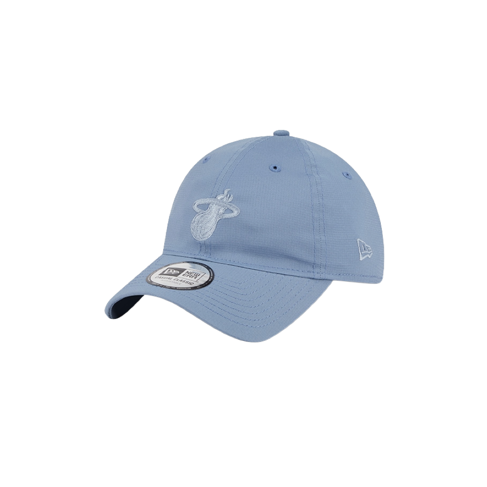 Light blue New Era dad hat with embroidered Miami HEAT logo and adjustable strap. - New Era Miami HEAT Blue Ripstop Dad Hat