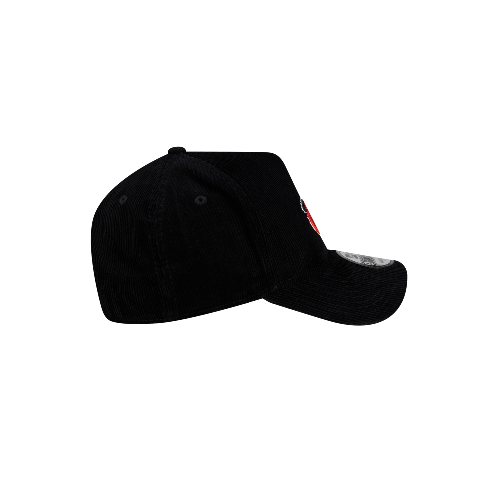 Black cotton corduroy Court Culture x New Era Corduroy Logo Dad Cap with a red and white logo on the side and a sticker on the curved brim.