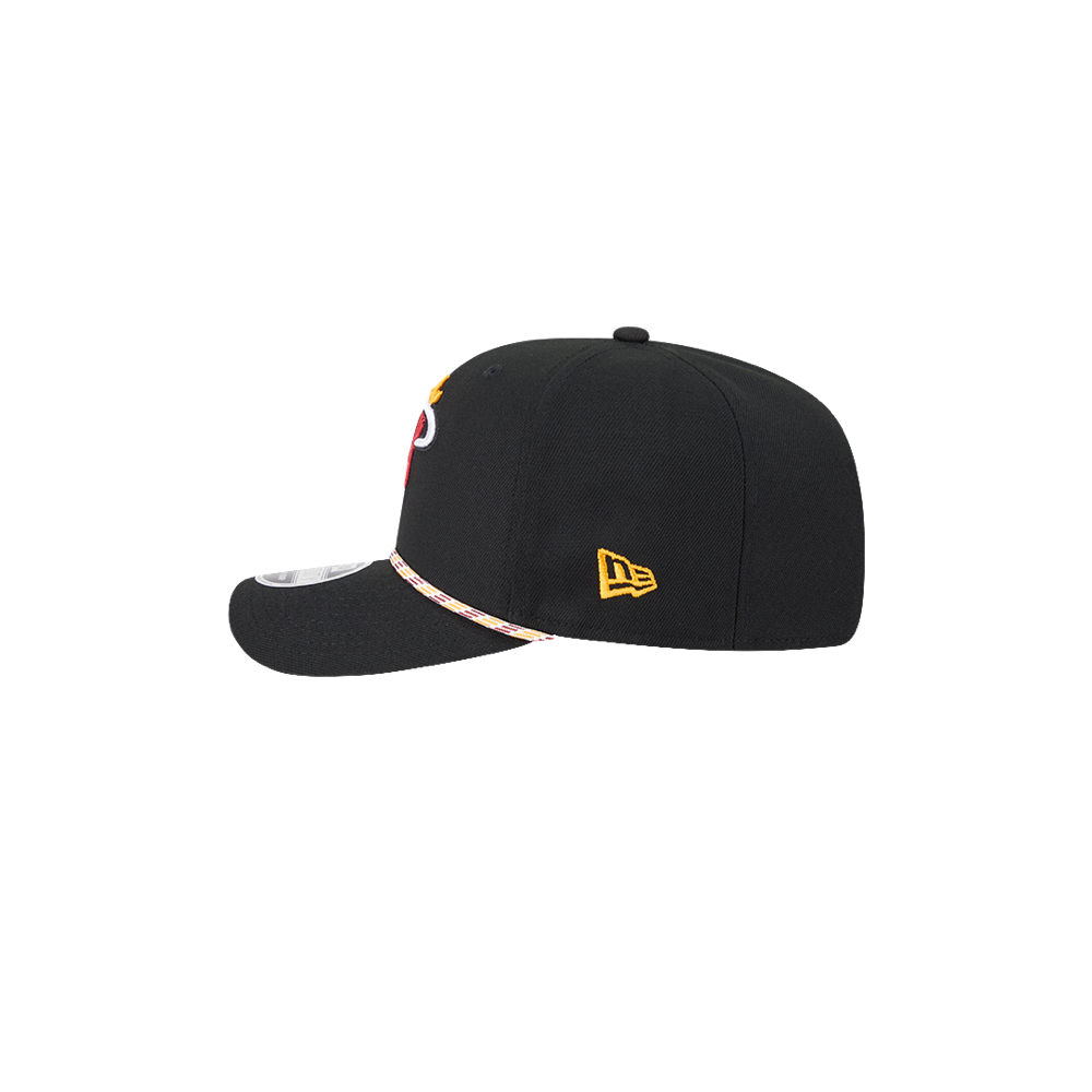 The New Era Miami HEAT Multi-Color Rope Snapback is a black cap with a flat brim, yellow side logo, and patterned trim. Shown in side profile on white, it offers moisture-wicking comfort for all-day wear.