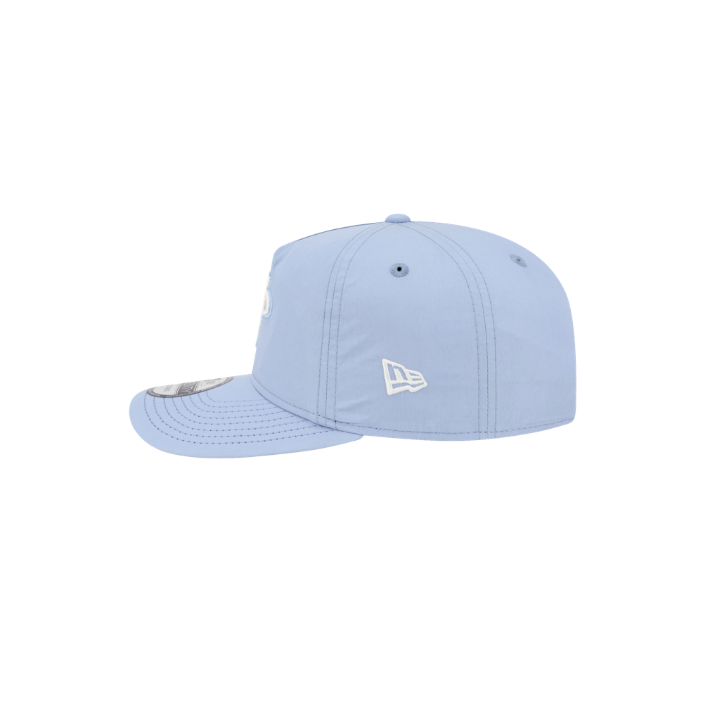 The New Era Miami HEAT Nylon Blue Snapback is a light blue cotton nylon hat with white stitching, a pre-curved visor, and a small white New Era logo embroidered on the side. One size fits most.