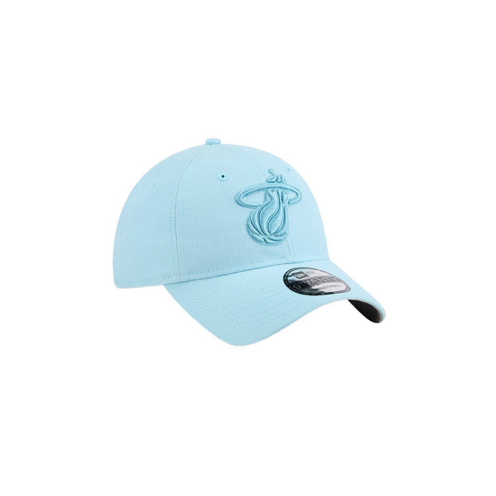 The New Era Miami HEAT Light Blue Color Pack Dad Hat features an embroidered team logo on the front, a curved brim with visor sticker, and a one-size-fits-most fit. Displayed on a plain white background.