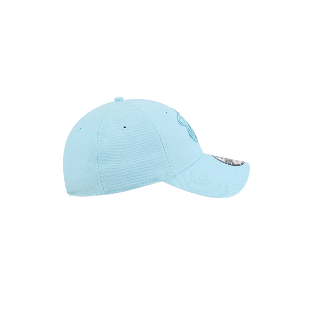 The New Era Miami HEAT Light Blue Color Pack Dad Hat is shown from the side with a curved brim and top button against a white background. Made of polyester, one size fits most; spot clean for best care.