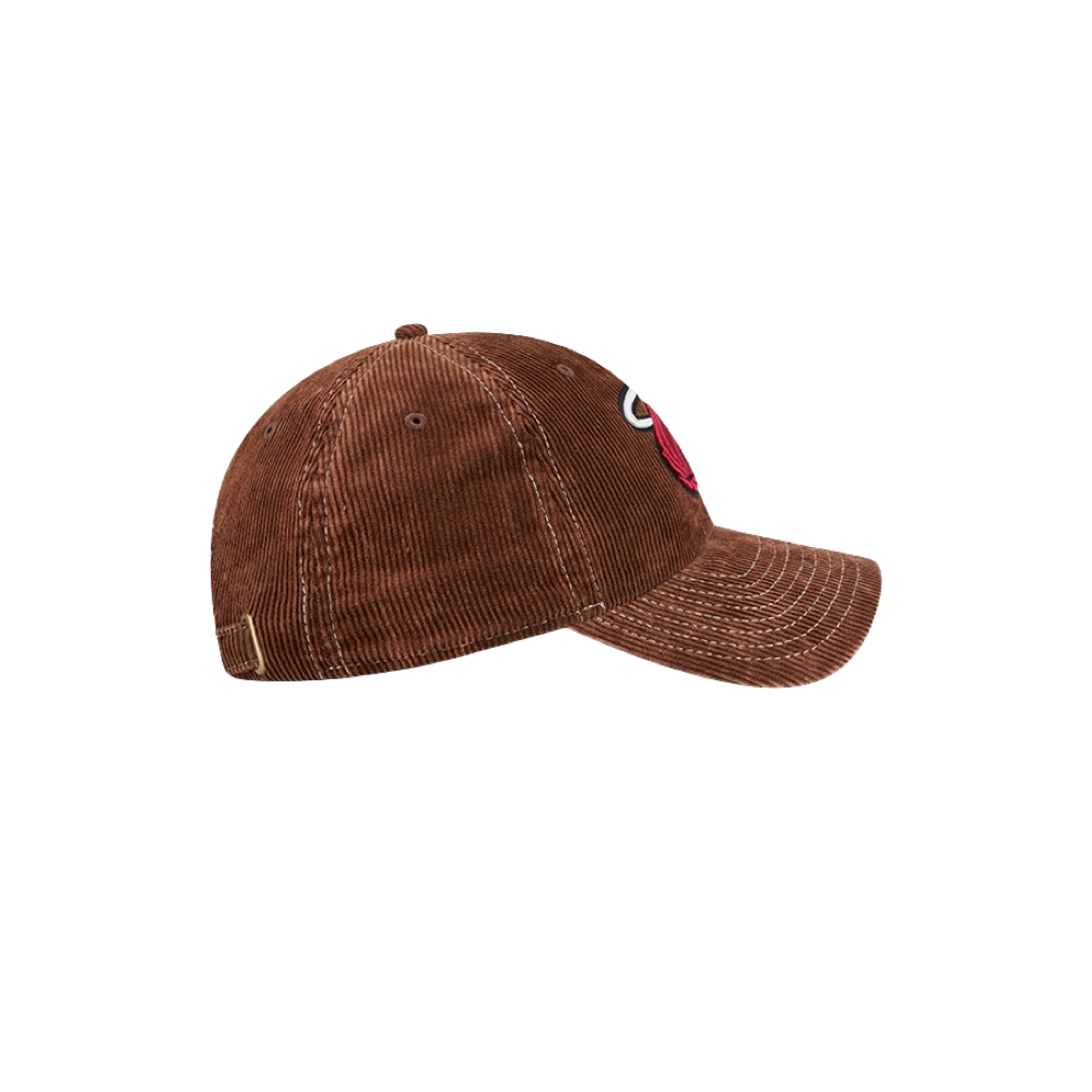 The New Era Miami HEAT Brown Corduroy Dad Hat features white stitching and a partially visible red and white embroidered patch on the front. Crafted from cotton for comfort and casual style, this classic one-size-fits-most cap is shown on a plain white background.