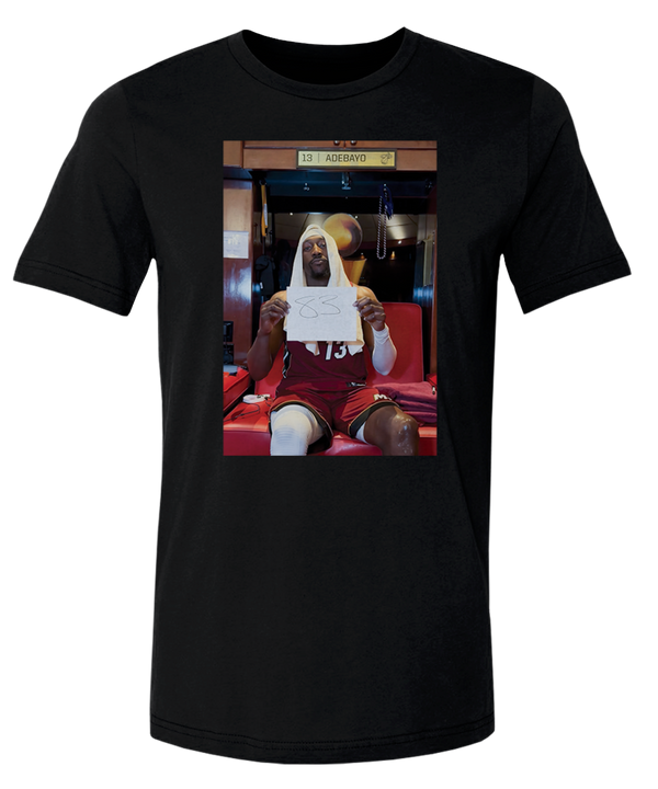 The Bam Adebayo 500 Level Miami HEAT 83 Points Moments Tee features a locker room photo of Bam holding a “33” sign on a bench, with “13 ADEBAYO” above the locker. Made from cotton polyester in standard fit by 500 Level.