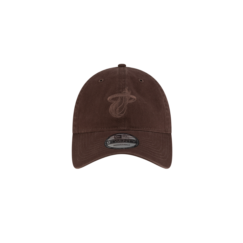 The Court Culture Ball & Flame Chocolate Dad Hat features a brown cotton build, embroidered Miami Heat logo, curved brim, adjustable back strap, and a one-size-fits-most design. Spot clean for best care.