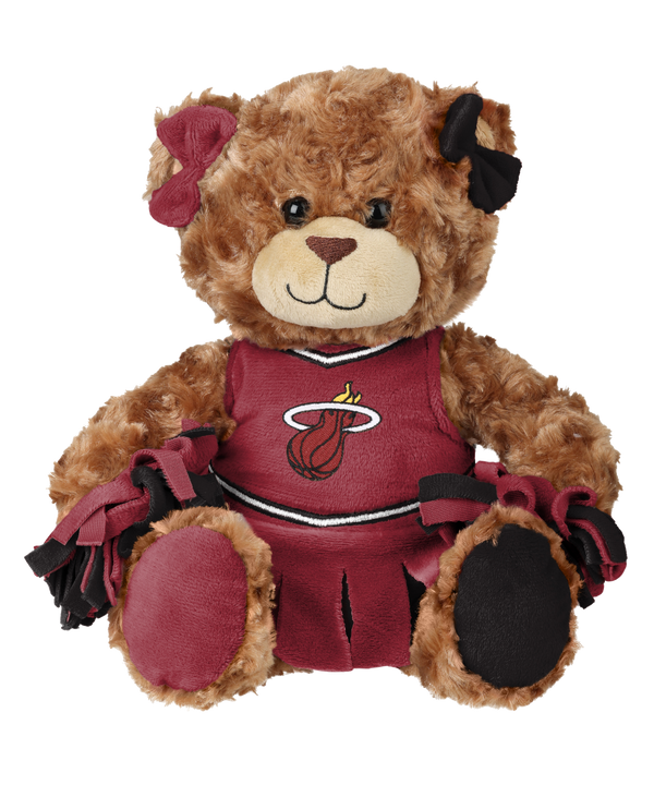The Miami HEAT Cheerleader Bear Plushie by Forever Collectibles is a 10-inch brown teddy bear in a maroon cheerleader outfit featuring the team logo, matching ear bows, and pom-poms. Made of soft polyester and surface washable, it sits against a white background.