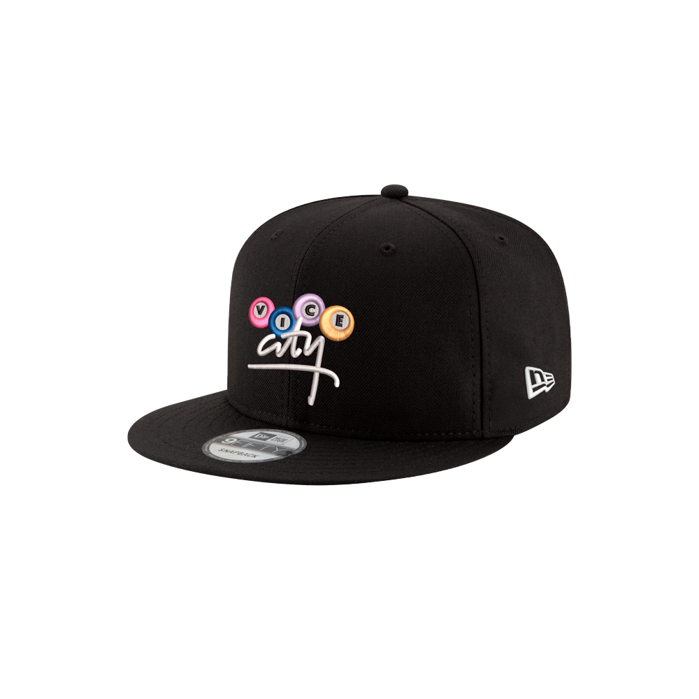 The Court Culture x New Era Vice City Billiards Snapback is a black polyester flat-brim hat with colorful VICE CITY text, a white underline, and an embroidered New Era logo. One size fits most; spot clean only.