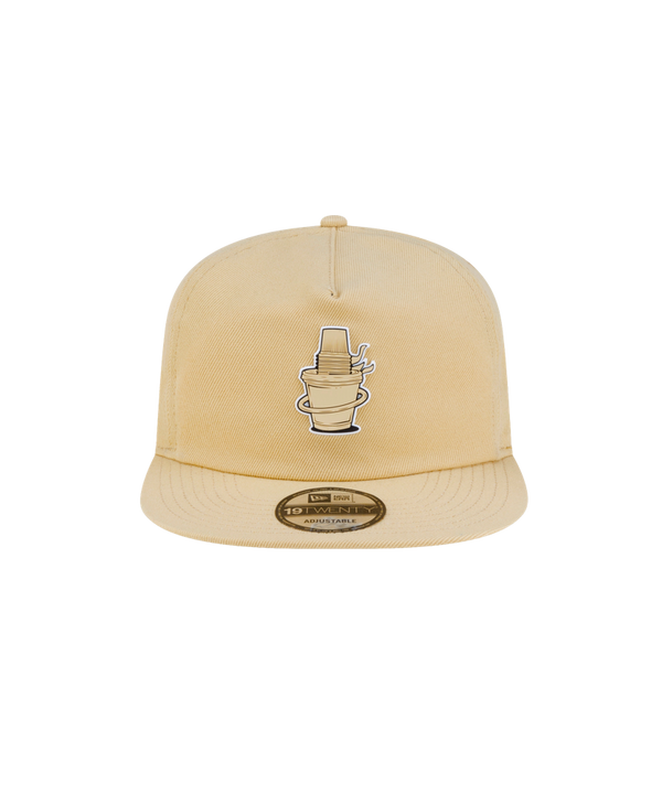 Light yellow polyester Court Culture x New Era Colada snapback hat featuring an embroidered graphic of stacked plastic cups on the front panel.