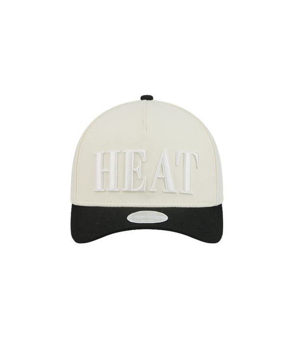 A white and black polyester New Era Miami HEAT 2-Tone Tonal Women’s Snapback features “HEAT” embroidered in large white letters on the front. This adjustable New Era cap is designed for comfort and style, ensuring a one-size-fits-most fit.