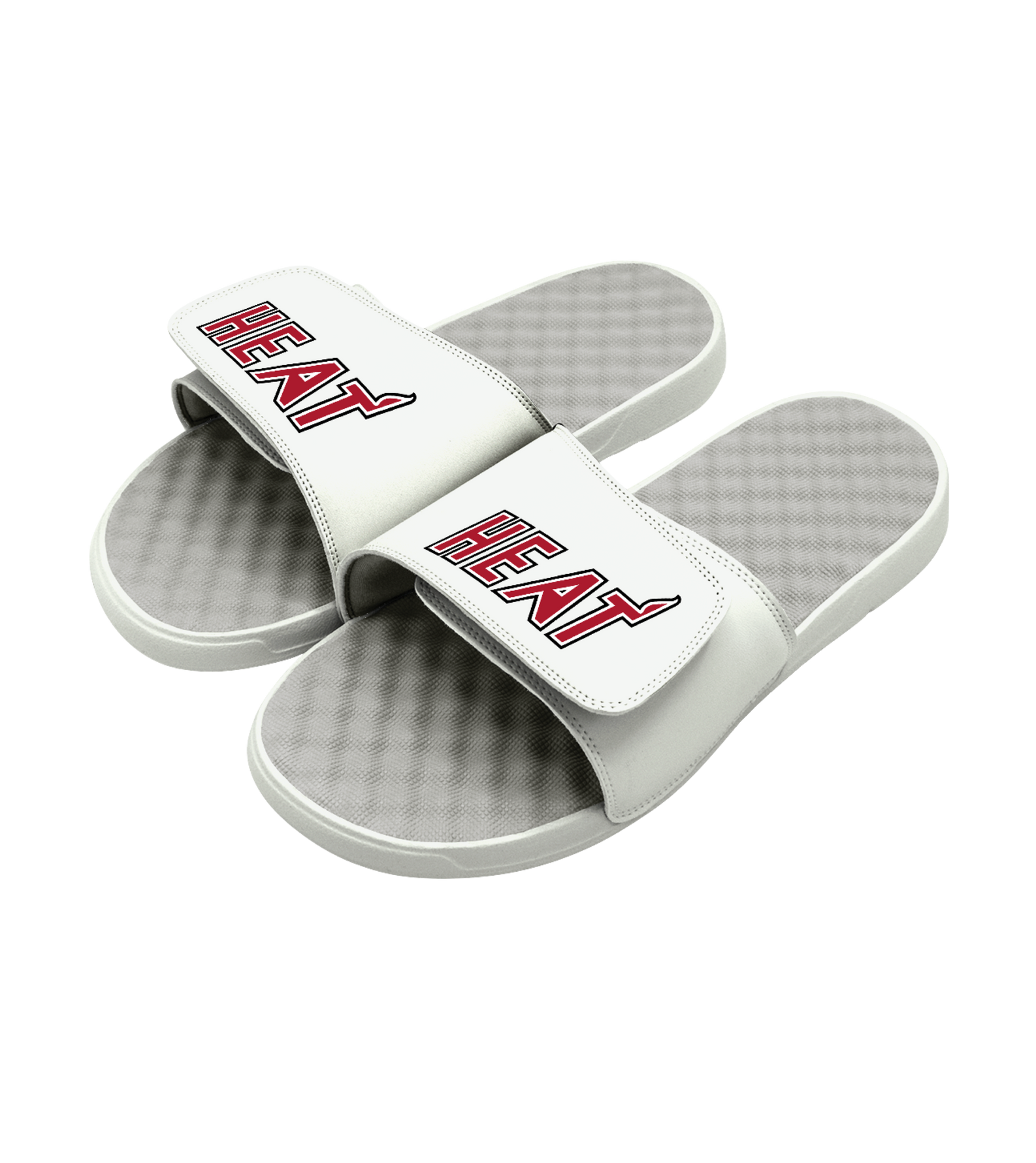 White slide sandals with textured footbed and 