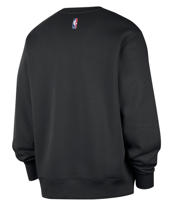 Experience everyday comfort with the Nike Miami HEAT Logo Fleece Crewneck. This black sweatshirt showcases the Miami Heat basketball team logo prominently on the chest, topped with a small white Nike Swoosh. Made from a soft cotton-polyester blend in a standard fit, it’s ideal for daily wear—just wash with like colors to keep it looking fresh.