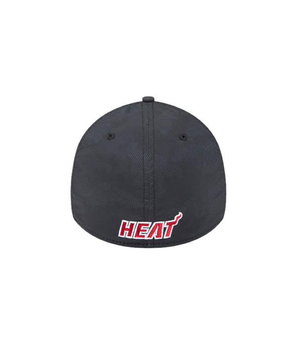 The New Era Miami HEAT Tonal Camo Flex Fit Hat is a black cap with the team's flaming basketball logo embroidered on the front. Made from polyester-spandex, this New Era hat should be spot cleaned for best care.
