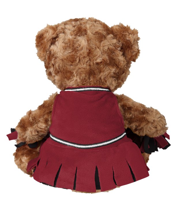 The Miami HEAT Cheerleader Bear Plushie by Forever Collectibles is a 10-inch brown teddy bear in a maroon cheerleader outfit featuring the team logo, matching ear bows, and pom-poms. Made of soft polyester and surface washable, it sits against a white background.