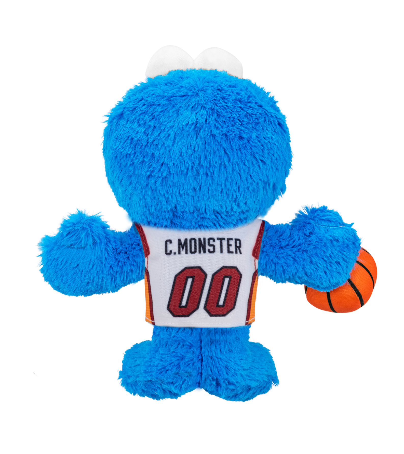 The Bleacher Creatures Miami HEAT Cookie Monster Association Plushie features a blue Cookie Monster with white eyes wearing a Miami HEAT basketball jersey labeled “C. MONSTER 00” and holding an orange basketball, shown from the back against a white background.