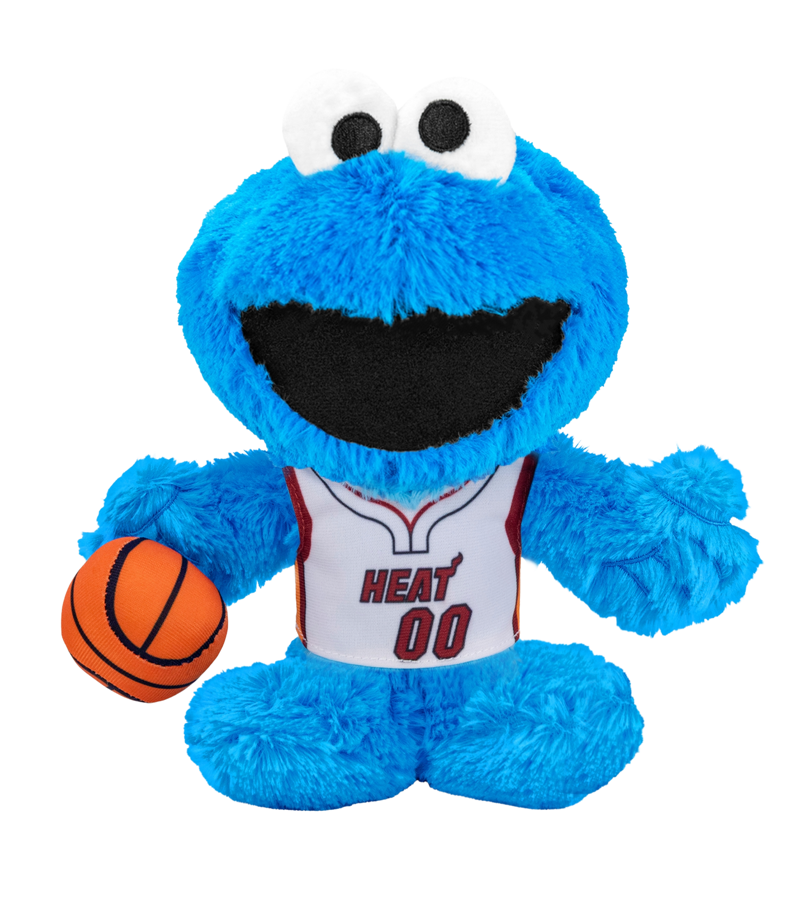 The Bleacher Creatures Miami HEAT Cookie Monster Association Plushie features Cookie Monster in a blue plush design with big eyes, wearing a Heat 00 basketball jersey and holding a small orange basketball in his left hand while smiling with his mouth open—making it the perfect collectible for any Sesame Street or Miami HEAT fan.