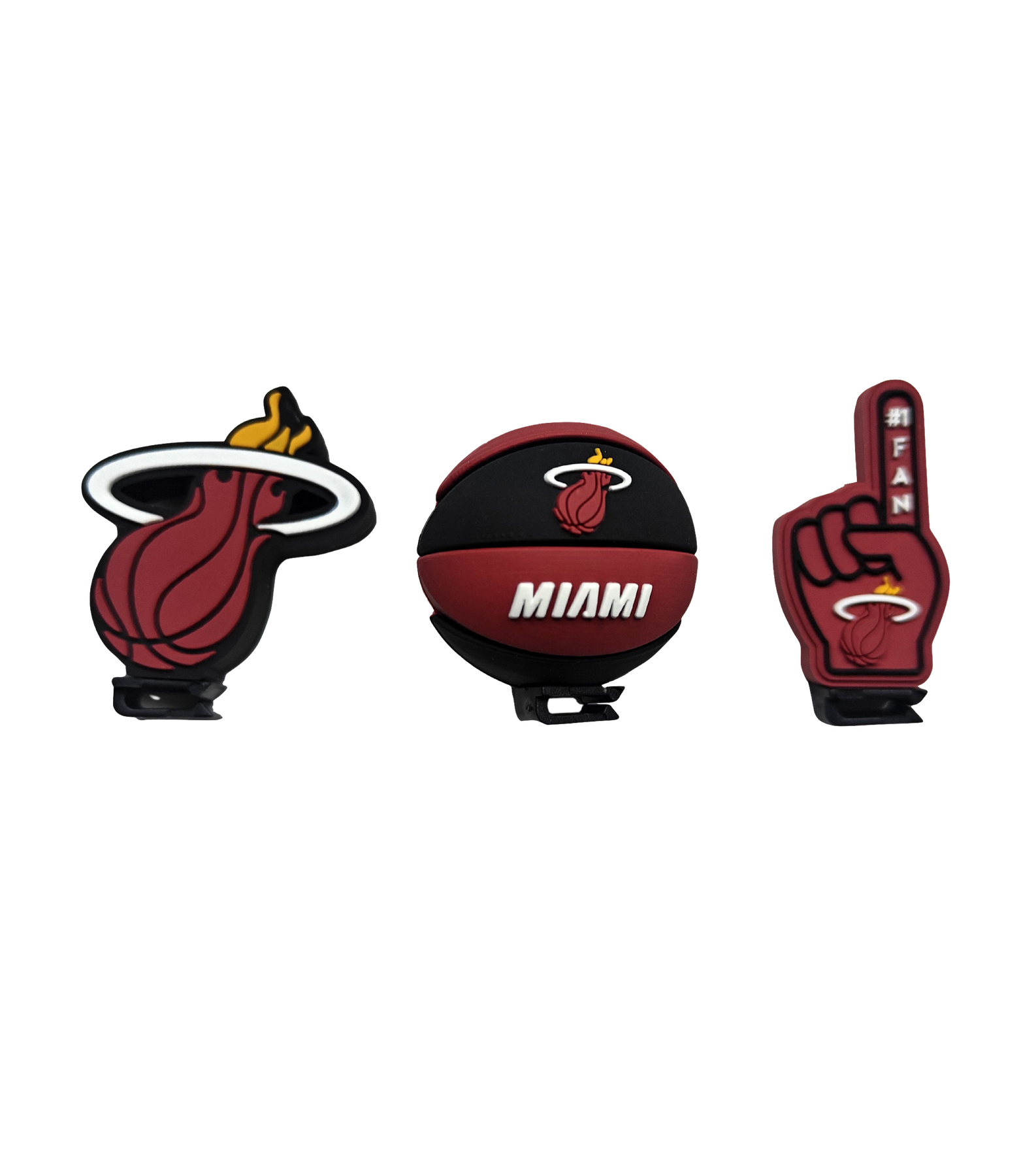 The Miami HEAT 3-Pack 3D Croc Charms by Forever Collectibles features a flaming basketball logo, MIAMI basketball, and #1 FAN foam finger. Officially licensed, perfect for footwear, each charm is set against a plain white background.