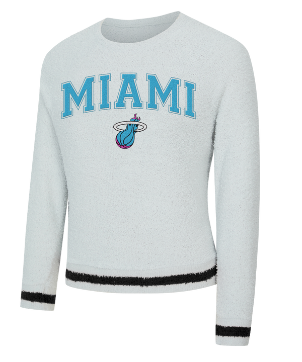 The Concepts Sports Miami HEAT Original Vice Nights Women's Crewneck is a white, oversized 100% cotton sweater featuring blue MIAMI lettering, the Miami Heat logo, black stripes on sleeves and hem, and is machine washable.
