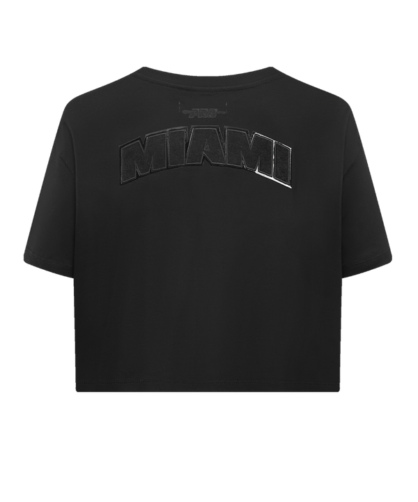 Black cropped women's tee with subtle Miami Heat logo on chest and sleeve patches.