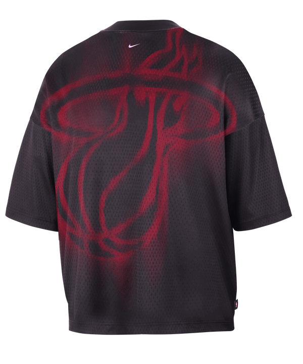 The Nike Miami HEAT Standard Issue Logo Game Tee is a loose-fitting, short-sleeve black t-shirt featuring a small white Nike logo and text on the chest. Crafted from washable polyester for a relaxed fit, it is displayed on a plain white background.