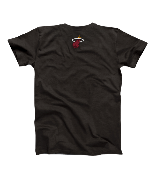 The Miami HEAT Paper Duck Tape Tee by Duck Tape is a black t-shirt featuring “MIAMI” in orange NBA style on a white, torn-paper strip held by four Duck Tape pieces. Made from recycled cotton with a small yellow logo at the lower left.