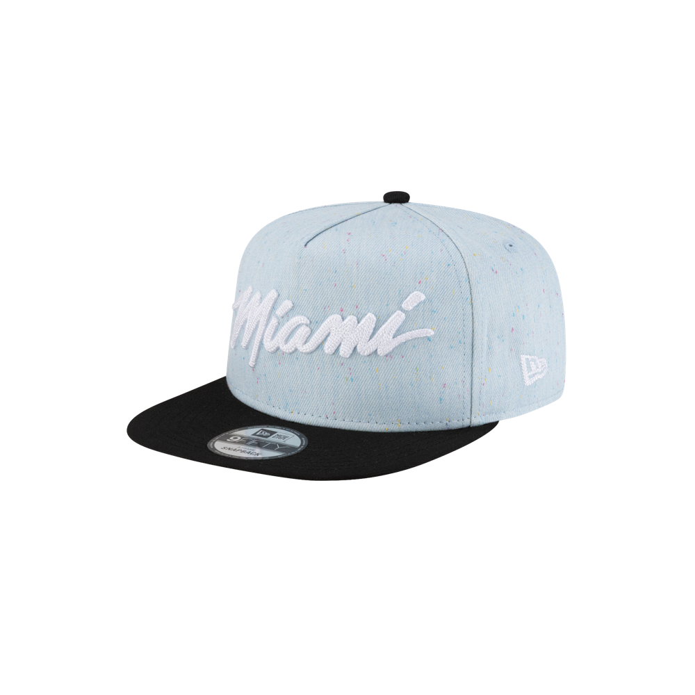 The Court Culture Original Vice Nights Wordmark Snapback in denim/black features “Miami” in bold white script on the front, a small white logo on the side, a stickered brim, and an adjustable fit. Spot clean for best care.