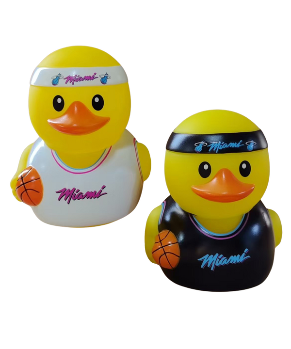 The Miami HEAT Original Vice Nights 2-Pack Vinyl Ducks by Forever Collectibles features two 5-inch officially licensed basketball ducks in Miami-themed jerseys, each holding an orange basketball—perfect for decorative use.
