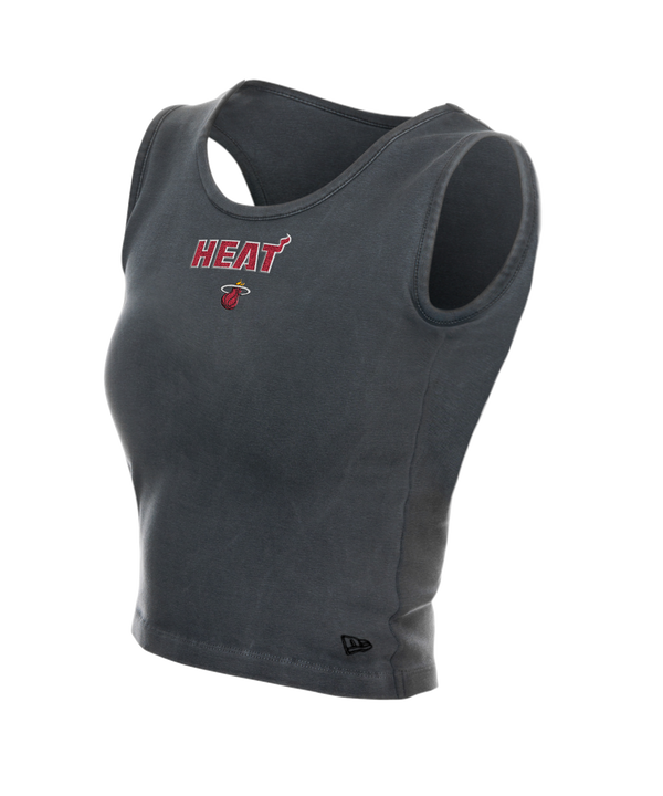 The New Era Miami HEAT Women's Clear Glitter Tank Top is a sleeveless, dark gray crop top in a standard fit with the team logo and name on the front. Made from cotton elastane and best cared for with a cold machine wash.