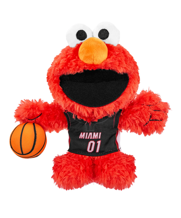 The Bleacher Creatures Miami HEAT Elmo Plush features Elmo in a black 01 jersey holding a basketball, making it an adorable NBA x Sesame Street collectible for fans of all ages.