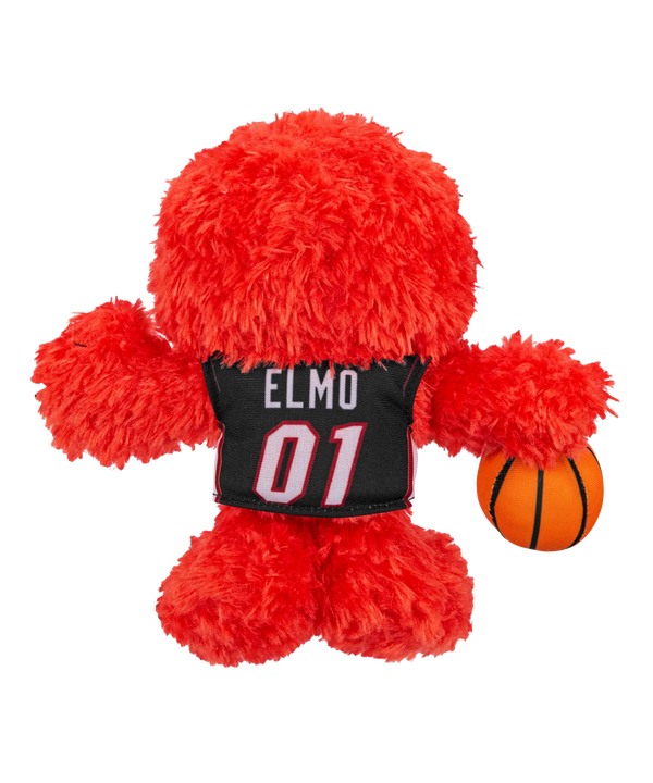 The Bleacher Creatures Miami HEAT Elmo Plush features Elmo in a black 01 jersey holding a basketball, making it an adorable NBA x Sesame Street collectible for fans of all ages.