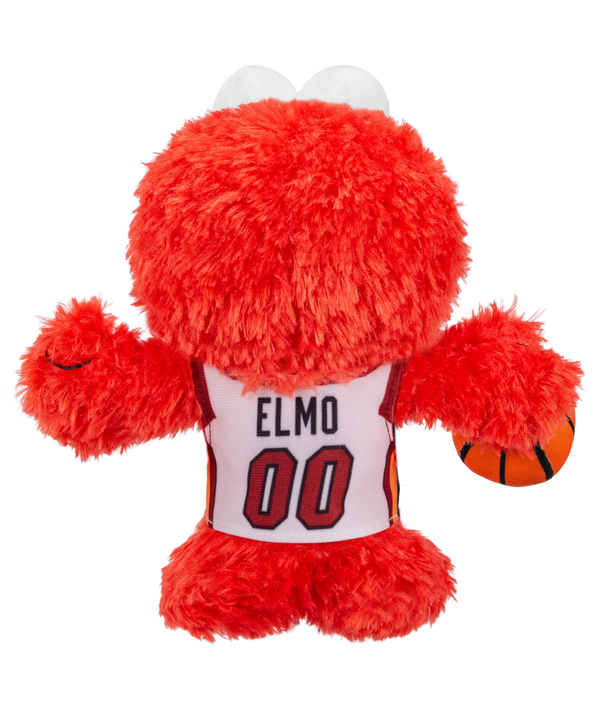 The Bleacher Creatures Miami HEAT Elmo Association Plushie features Sesame Street’s Elmo wearing a white Miami HEAT jersey with “Heat 00,” and holding an orange basketball in his left hand.