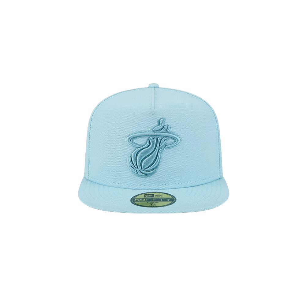 The New Era Miami HEAT Light Blue Color Pack Fitted Hat features the team logo embroidered on the front, a structured fit, flat brim with gold sticker, and is crafted from durable polyester for comfort.