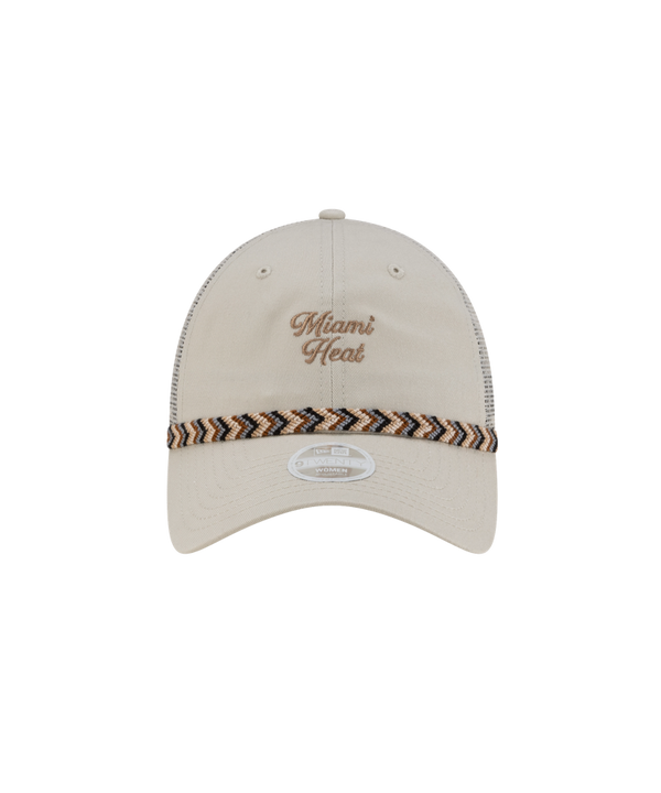 The New Era Miami HEAT Fishtail Women's Trucker Hat features beige cotton front panels, brown embroidered text, a brown and black patterned band above the brim, mesh polyester rear panels, and an adjustable one-size-fits-most design.