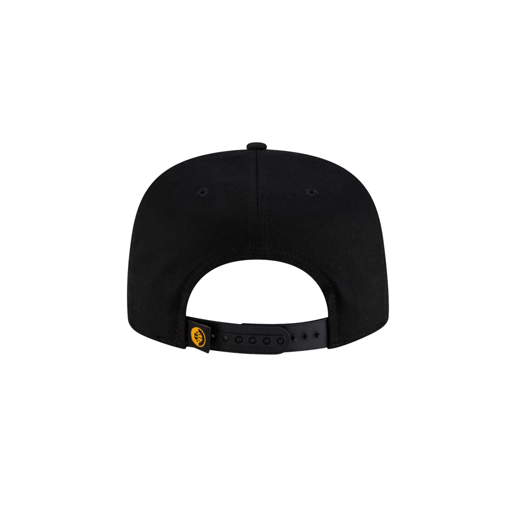 Back view of a black Court Culture x New Era Palm n’ Flame snapback cap, featuring an adjustable strap with a small yellow circular logo tab.