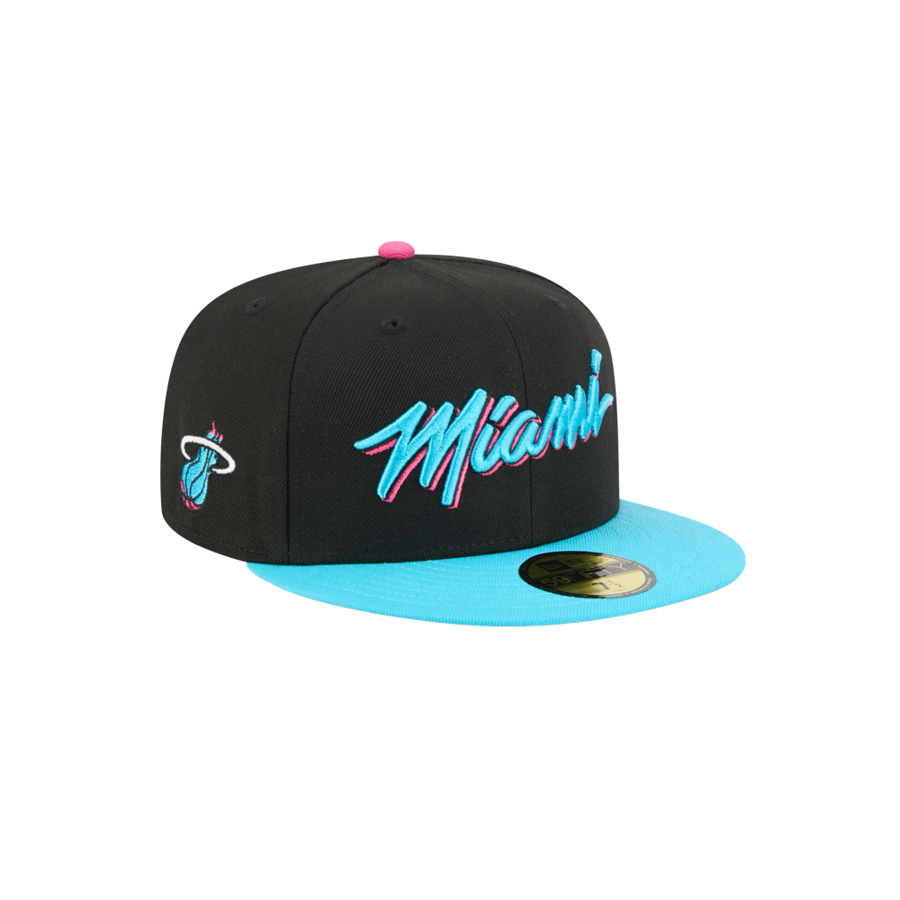 The New Era Miami HEAT Original Vice Nights Fitted Hat features a black and blue design with a light blue brim, 