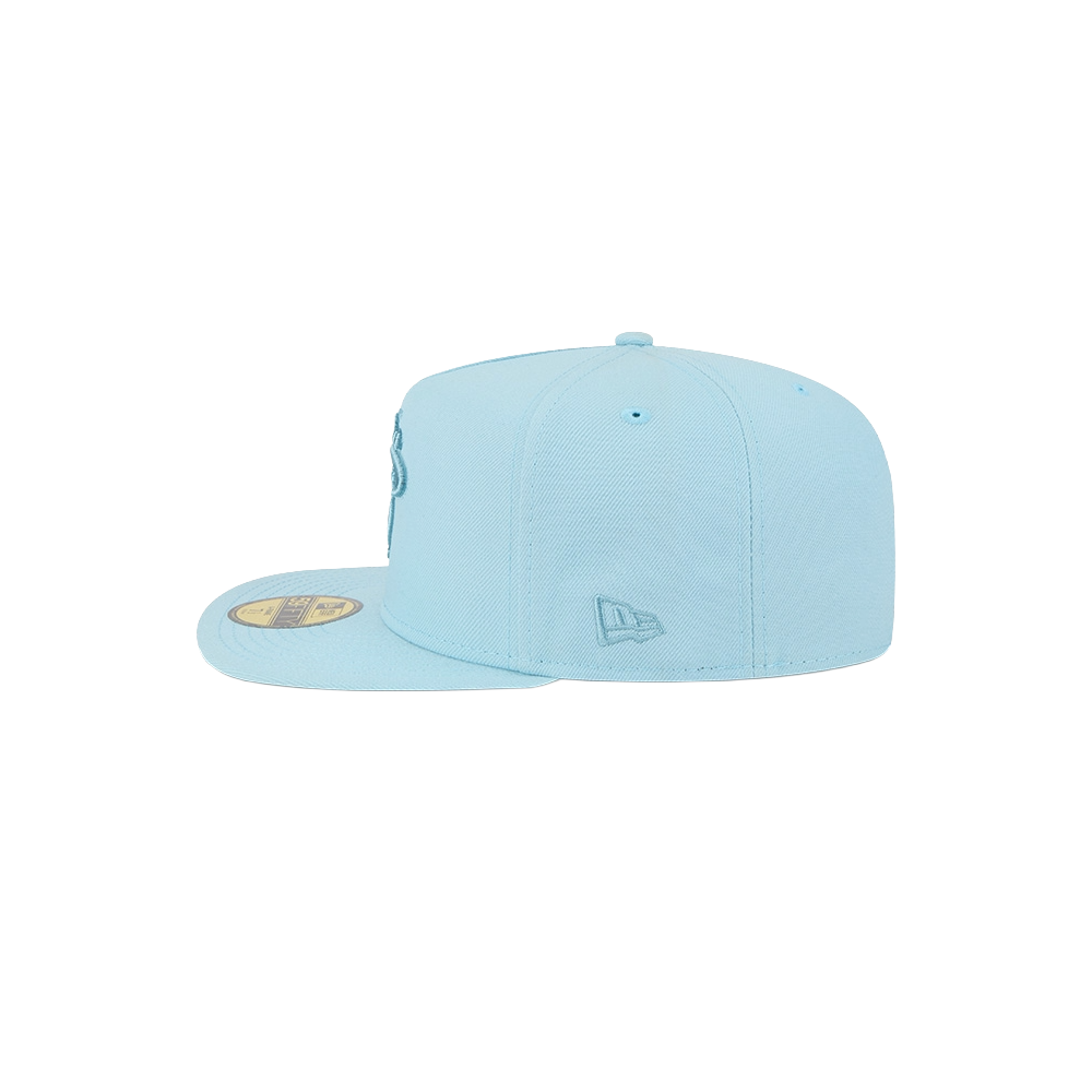 The New Era Miami HEAT Light Blue Color Pack Fitted Hat features a light blue polyester flat-brim, fitted design, subtle side embroidered logo, and a round brim sticker, all displayed against a plain white background.