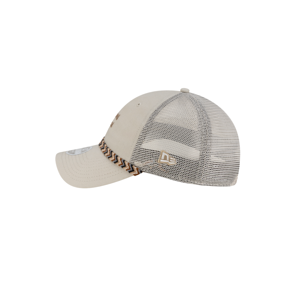 The New Era Miami HEAT Fishtail Women's Trucker Hat features a beige mesh design, tan cotton front, patterned band, curved brim, adjustable strap, metal side logo, and polyester back panels. One size fits most.
