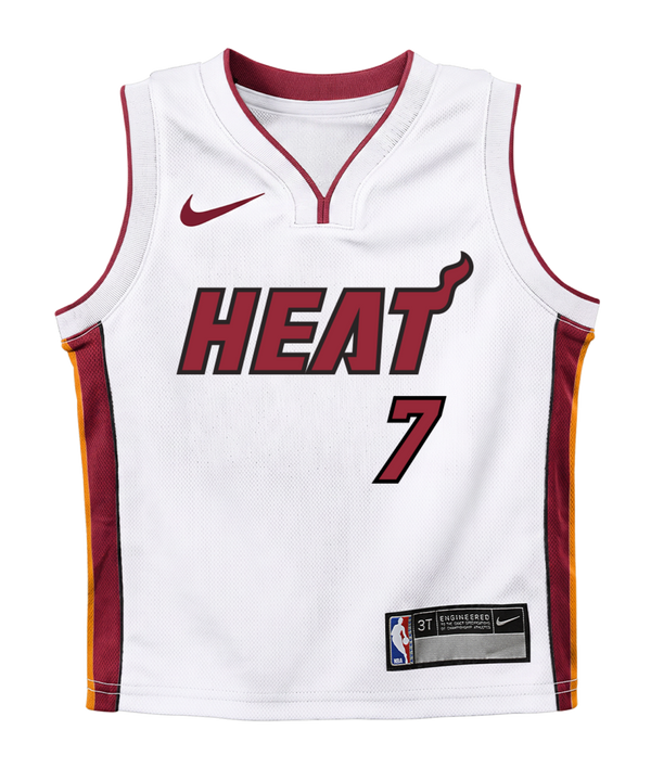 A white Giannis Antetokounmpo Nike Association Toddler Replica Jersey featuring red and yellow accents, the iconic Nike logo, and the number 7 on the front. Crafted from polyester in a standard fit, this Miami Heat jersey is easy to care for—just machine wash and wear.