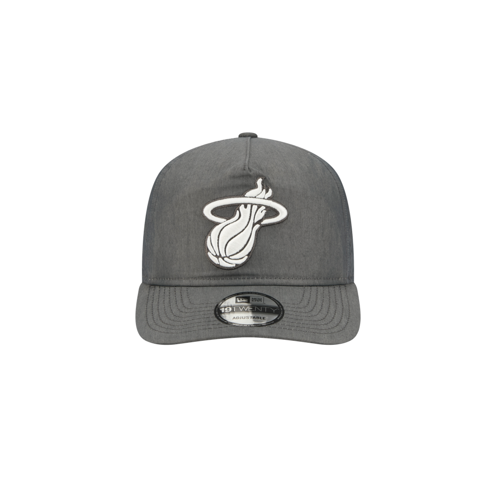 The New Era Miami HEAT Nylon Grey Snapback is a gray adjustable cotton-nylon cap with a white Miami Heat flaming logo, pre-curved visor, 