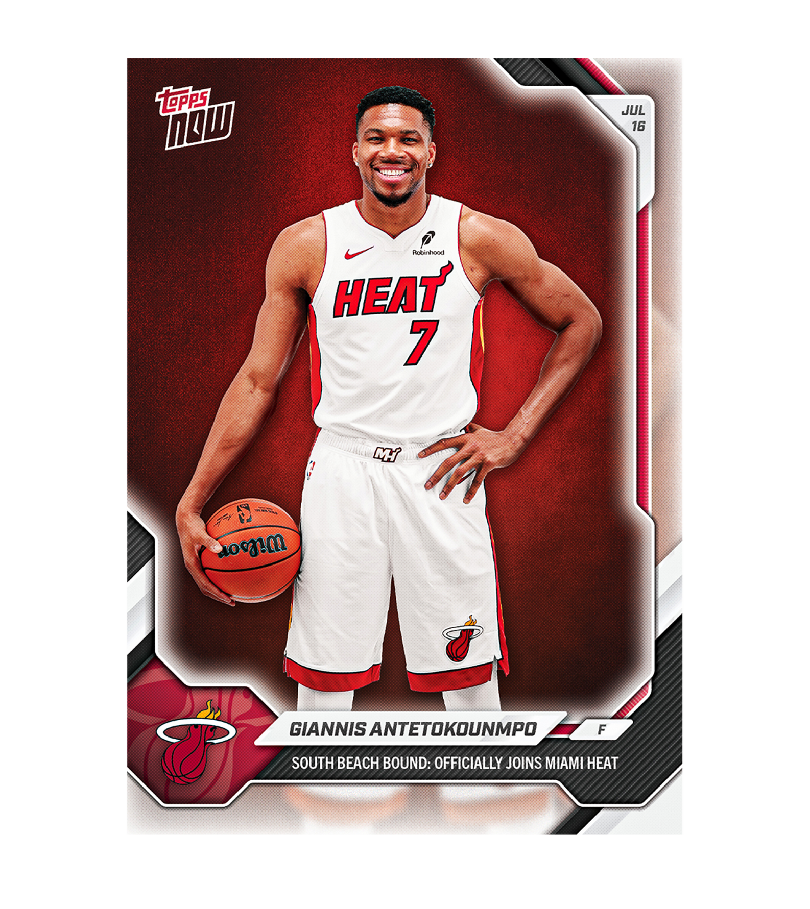 A basketball player in a Miami HEAT uniform stands smiling, holding a basketball. The TOPPS Giannis Antetokounmpo 2026-27 Topps NOW® Card OS02 commemorates Giannis Antetokounmpo’s official arrival to the Miami HEAT.