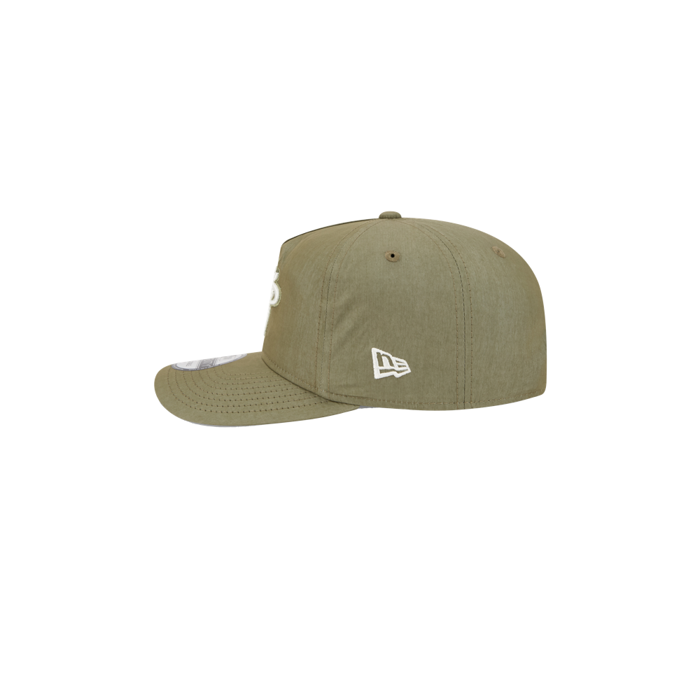 Side view of the New Era Miami HEAT Nylon Green Snapback, an olive green cotton-nylon hat with a pre-curved visor and white embroidered logos, set against a plain white background.